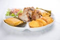 Peruvian food: Chicharrones, tamales, camote frito Royalty Free Stock Photo