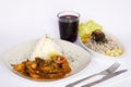 PERUVIAN FOOD: Lunch Cebiche and Picante de Mariscos with rice and a glass of chicha morada Royalty Free Stock Photo