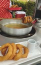 Peruvian Food, Preparing Picarones, Peruvian classic dessert, picarones with honey.