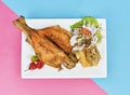 PERUVIAN FOOD, typical dish Fried trout, with rice, yucca and salad, Sective Focus Royalty Free Stock Photo