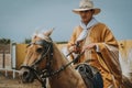 Peruvian Morochuco cowboy on horse