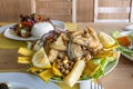 Peruvian recipe for a jalea dish with assorted battered fish, battered Royalty Free Stock Photo