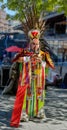 Peruvian street musician with pan flute performing music and dan