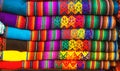 Peruvian traditional colourful native handicraft textile fabric at market in Machu Picchu, one of the New Seven Wonder of The