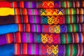 Peruvian traditional colourful native handicraft textile fabric at market in Machu Picchu, one of the New Seven Wonder of The