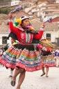 Peruvian Woman dancing at festival