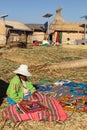 Peruvian woman on a reed island