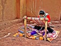 Peruvian Woman Weaving on Traditional Loom Royalty Free Stock Photo