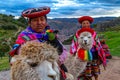 Peruvian Women and Blue Eyed Llama