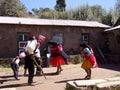 Peruvians dancing in costumes on Taquile Island