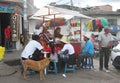 Peruvians Eating at Fried Chicken Kiosk Royalty Free Stock Photo