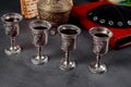Pesach Passover symbols of great Jewish holiday. Traditional matzoh, matzah or matzo and wine in vintage silver glass