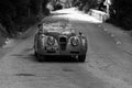 JAGUAR XK 140 SE DROP HEAD COUPÃâ° 1955 on an old racing car in rally Mille Miglia 2017 Royalty Free Stock Photo