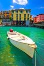 Peschiera del Garda colorful harbor and boats vertical view Royalty Free Stock Photo