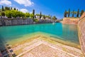 Peschiera del Garda turquoise channel around town walls view