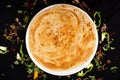 Peshawari paratha served in dish isolated on dark background top view of indian spices food