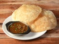 Peshwari Chole Bhature, spicy Chick Peas curry also known as Chole or Channa Masala usually served with fried puri or Bhature,