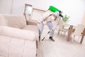 Pest control contractor working in the flat Royalty Free Stock Photo