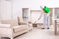 The pest control contractor working in the flat Royalty Free Stock Photo