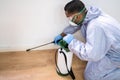 Pest Control Exterminator Man Spraying Termite Pesticide