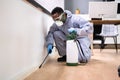 Pest Control Exterminator Man Spraying Termite Pesticide Royalty Free Stock Photo