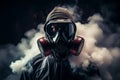 Pest control technician in protective suit spraying poisonous gas for pest elimination