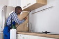 Worker Spraying Pesticide With Sprayer Royalty Free Stock Photo