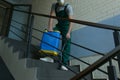 Pest control worker spraying pesticide on stairs, closeup Royalty Free Stock Photo