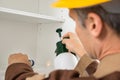 Pest control worker spraying pesticides Royalty Free Stock Photo