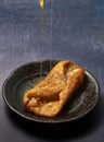 PestiÃÂ±os, Spanish honey-coated fritters. Royalty Free Stock Photo