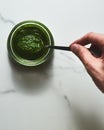 Pesto genovese or Pesto Verde. Italian sauce dip for pasta or other dishes. Green Pesto with basil and pine nuts and Royalty Free Stock Photo