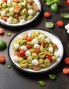 Pesto Pasta Salad with Cherry Tomatoes and Mozzarella cheese. Healthy food. Royalty Free Stock Photo