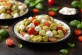 Pesto Pasta Salad with Cherry Tomatoes and Mozzarella cheese. Healthy food. Royalty Free Stock Photo