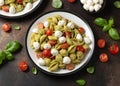 Pesto Pasta Salad with Cherry Tomatoes and Mozzarella cheese. Healthy food. Royalty Free Stock Photo