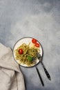 Pesto spaghetti with tomatoes for dinner Royalty Free Stock Photo