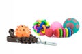 Rubber toys and leather of leashes for dog or cat on white background Royalty Free Stock Photo