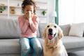 Dog Allergy. African American girl sneezing, suffering from nasal congestion Royalty Free Stock Photo