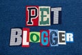 PET BLOGGER text word collage colorful fabric on blue denim, animals and pets blogs and blogging