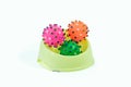 Pet bowl and rubber toys for dog or cat isolated