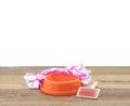 Pet bowls, rope and brush on wood with copy space Royalty Free Stock Photo