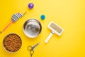 Pet, cat, food and accessories of cat life flat lay, with space for design, on yellow background Royalty Free Stock Photo