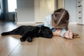 Pet dog labrador and little girl love each other Royalty Free Stock Photo
