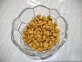 Pet food in a glass bowl. Crunchy cereals for pet