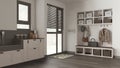 Pet friendly mudroom, laundry room, cabinets and shelves in dark and wooden tones. Dog bath shower with mosaic tiles and