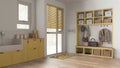 Pet friendly mudroom, laundry room, cabinets and shelves in yellow and wooden tones. Dog bath shower with mosaic tiles and