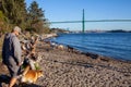 A pet owner walks his dog on the Ambleside Dog Park in West Vancouver