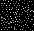 Pet paws white on black seamless pattern background.