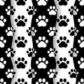 Pet prints. Paw seamless pattern. Cute background for pets, dog or cat. Foot puppy. Black silhouette shape paw. Footprint pet. Ani Royalty Free Stock Photo