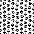 Pet prints. Paw seamless pattern. Cute background for pets, dog or cat. Foot puppy. Black silhouette shape paw. Footprint pet. Ani Royalty Free Stock Photo
