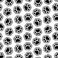 Pet prints. Paw seamless pattern. Cute background for pets, dog or cat. Foot puppy. Black silhouette shape paw. Footprint pet. Ani Royalty Free Stock Photo